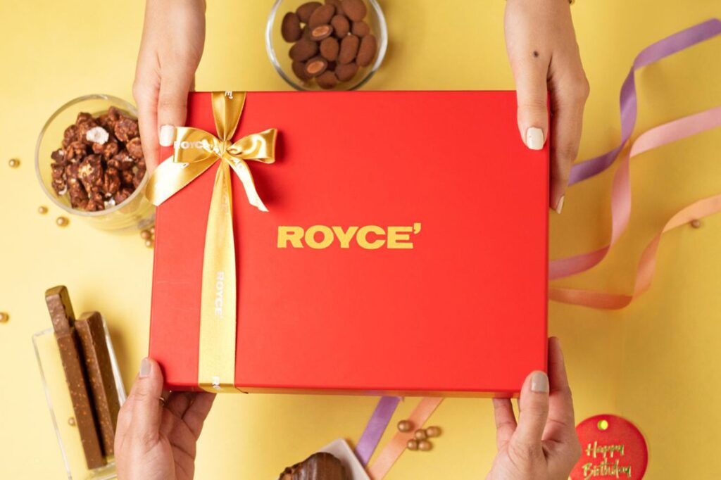 Royce Chocolate premium brand marketing visual featuring luxury product photography and gifting campaign elements